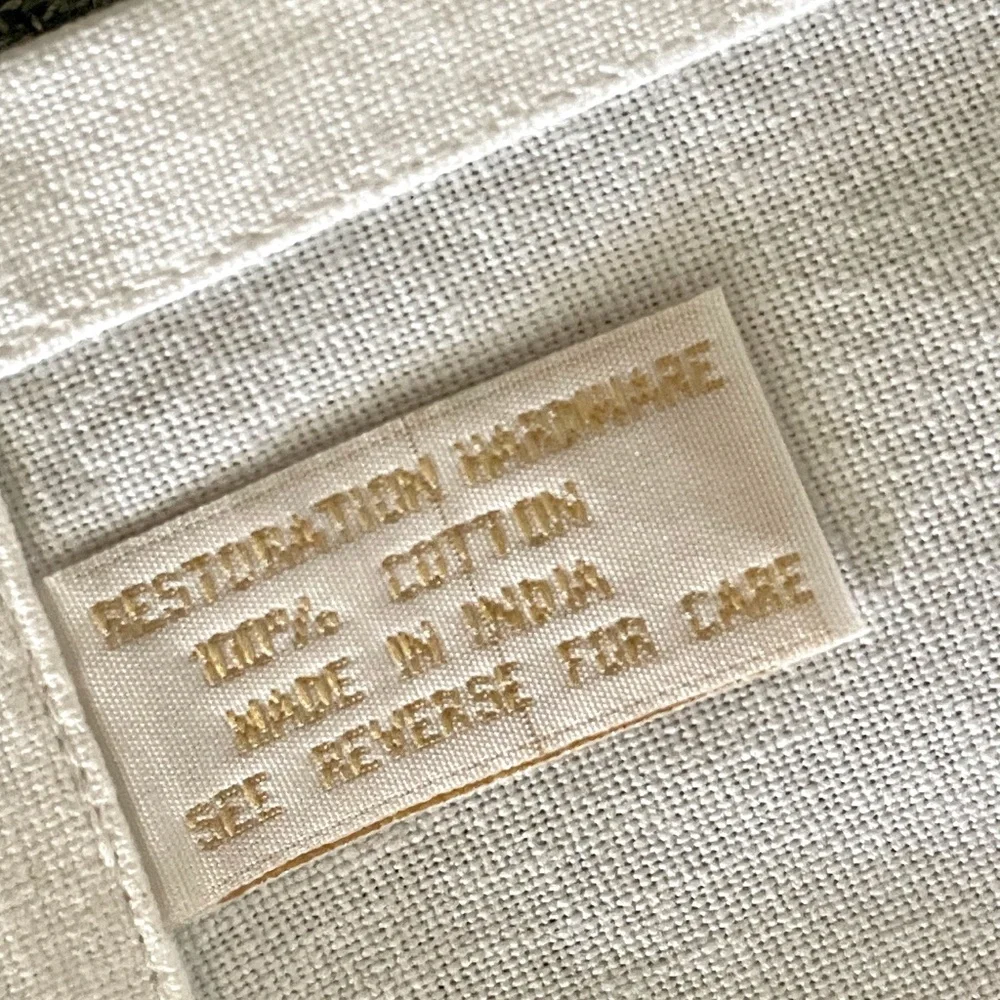 Linen Napkins from RH featuring an embroidered elf